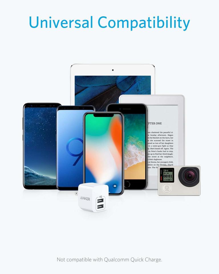 Compact Tabletop Multi-port wall charger bundled with flip out prongs for the Nikon Coolpix S32 Clean design charges up to four devices at once and upgradeable using Gomadic TipExchange